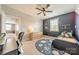 Well-lit bedroom with a celestial rug, large window, and a cozy decor at 12107 Grey Partridge Dr, Charlotte, NC 28278