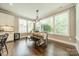 Dining area with hardwood floors and lots of natural light at 12107 Grey Partridge Dr, Charlotte, NC 28278
