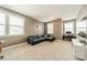 Upstairs living room featuring a corner sectional sofa, desk and carpet flooring at 12107 Grey Partridge Dr, Charlotte, NC 28278