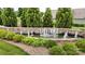 Water fountain with stone accents and landscaping, surrounded by lush greenery at 123 Hanks Bluff Dr, Mooresville, NC 28117