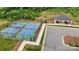 Overhead view of well-maintained community pickleball courts, adjacent to an outdoor pavilion at 123 Hanks Bluff Dr, Mooresville, NC 28117
