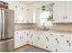 Clean kitchen featuring white cabinets, stainless steel appliances, and neutral countertops at 1325 Marshville Olive Branch Rd, Marshville, NC 28103