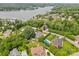 Aerial view showcasing lakefront homes with lush landscaping and private pools in a tranquil setting at 133 43Rd Avenue Nw Ln, Hickory, NC 28601