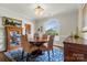 Elegant dining room featuring a round table, chandelier, and a large window at 133 43Rd Avenue Nw Ln, Hickory, NC 28601