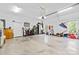 Spacious garage with ample storage, including shelving and room for multiple vehicles at 133 43Rd Avenue Nw Ln, Hickory, NC 28601