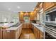 Bright kitchen with a center island, stainless steel appliances, and light wood cabinetry at 133 43Rd Avenue Nw Ln, Hickory, NC 28601