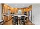 Well-lit kitchen with a large island, stainless steel appliances, and light wood cabinets at 133 43Rd Avenue Nw Ln, Hickory, NC 28601