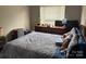 Cozy bedroom with a comfortable bed and natural light from the window at 1421 Piney Church Rd, Concord, NC 28025