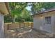 Inviting wooden back deck with railings, offering a relaxing outdoor space at 1522 Barberry Ct, Charlotte, NC 28211