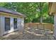 Wooden back deck features backyard access and built-in railings, perfect for outdoor relaxation at 1522 Barberry Ct, Charlotte, NC 28211