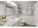 Clean bathroom featuring a granite counter, classic vanity, framed mirror, and white subway tile backsplash at 1522 Barberry Ct, Charlotte, NC 28211