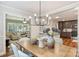 Open dining area with views of the living room and kitchen, perfect for entertaining at 1522 Barberry Ct, Charlotte, NC 28211