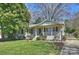 Charming single-Gathering home with well-maintained landscaping, a front porch, and ample curb appeal at 1522 Barberry Ct, Charlotte, NC 28211