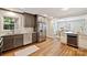 Kitchen with granite countertops, stainless steel appliances, and a wine cooler at 1522 Barberry Ct, Charlotte, NC 28211