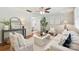 Comfortable living room featuring hardwood floors and plenty of seating at 1522 Barberry Ct, Charlotte, NC 28211