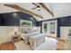 Bedroom featuring hardwood floors, vaulted ceiling, exposed beams, and french doors at 1522 Barberry Ct, Charlotte, NC 28211