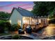 A spacious deck, patio, and outdoor grill create the perfect backyard retreat at 15301 Marsh Field Ct, Huntersville, NC 28078