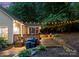 The backyard features a spacious deck and patio, perfect for relaxing or entertaining at 15301 Marsh Field Ct, Huntersville, NC 28078
