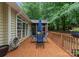 Spacious deck with outdoor dining area, lush greenery, and privacy at 15301 Marsh Field Ct, Huntersville, NC 28078