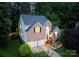 Stunning home with a well-manicured lawn, a two-car garage, a blue front door, and professional landscaping at 15301 Marsh Field Ct, Huntersville, NC 28078