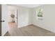 Bedroom featuring a window with natural light, wood flooring, and neutral walls at 1574 Mangum Dr, Lancaster, SC 29720
