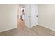 Bedroom view into the kitchen with wood flooring and neutral walls at 1574 Mangum Dr, Lancaster, SC 29720