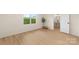 Cozy bedroom featuring wood-look flooring, neutral paint, and an updated window with natural light at 1574 Mangum Dr, Lancaster, SC 29720