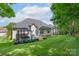 Expansive backyard featuring a well-maintained lawn and a charming gazebo on the deck at 1643 Essex Hall Dr, Rock Hill, SC 29730