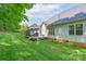 Lush green backyard featuring a spacious deck and a cozy gazebo for outdoor enjoyment at 1643 Essex Hall Dr, Rock Hill, SC 29730