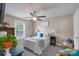 Cozy bedroom features a ceiling fan, a window, and tasteful decor for comfortable living at 1643 Essex Hall Dr, Rock Hill, SC 29730