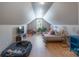 Finished attic bonus room provides a flexible space for relaxation, work, and recreation at 1643 Essex Hall Dr, Rock Hill, SC 29730