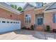 Close up of brick home featuring attached two car garage at 1643 Essex Hall Dr, Rock Hill, SC 29730