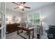 Bright home office with a large window, desk, and ample workspace at 1643 Essex Hall Dr, Rock Hill, SC 29730