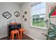 Stylish dining area with a bar, unique mirrors, and a view of the backyard at 17812 New Mark Ave, Charlotte, NC 28278