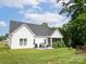 Well-maintained backyard with patio and seating, perfect for outdoor gatherings and relaxation at 182 Mackenzie Ct, China Grove, NC 28023