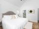 Spacious Primary bedroom featuring a king bed, vaulted ceiling and ensuite bath, plus lots of natural light at 182 Mackenzie Ct, China Grove, NC 28023
