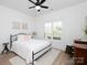 Tranquil bedroom with hardwood floors, plantation shutters, neutral colors, and calming decor at 182 Mackenzie Ct, China Grove, NC 28023