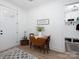 Inviting entryway featuring a dining table, coat rack, and a stylish rug, perfect for welcoming guests at 182 Mackenzie Ct, China Grove, NC 28023