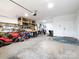 Spacious garage with ample storage, shelving, and lots of open floor space at 182 Mackenzie Ct, China Grove, NC 28023