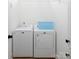This efficient laundry room includes a washer, dryer, and ample space for laundry needs at 182 Mackenzie Ct, China Grove, NC 28023