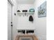 Well-organized mudroom with built-in shelving, coat hooks, and bench seating at 182 Mackenzie Ct, China Grove, NC 28023