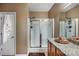 A bathroom featuring a glass-door shower and granite countertops at 19539 Denae Lynn Dr, Cornelius, NC 28031