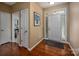 Inviting foyer with hardwood floors, natural light, and a view of the entryway at 19539 Denae Lynn Dr, Cornelius, NC 28031