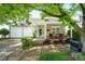 Charming home featuring a covered porch with cozy seating and a two-car garage at 19539 Denae Lynn Dr, Cornelius, NC 28031