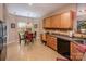Functional kitchen with eat-in dining nook and appliances and wooden cabinets at 19539 Denae Lynn Dr, Cornelius, NC 28031