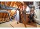 Unfinished attic space with exposed beams and ductwork, offering potential for customization at 1974 Glen Manor Ct, Lincolnton, NC 28092