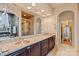 Luxury bathroom with double vanity, granite countertops, and stone-accented shower at 1974 Glen Manor Ct, Lincolnton, NC 28092