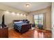 Bedroom with hardwood floors and natural light at 1974 Glen Manor Ct, Lincolnton, NC 28092