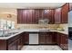 Well-equipped kitchen with granite countertops, stainless appliances, and lots of cabinet storage at 1974 Glen Manor Ct, Lincolnton, NC 28092