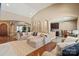 Open-concept living room with hardwood floors and seamless flow into the kitchen and dining areas at 1974 Glen Manor Ct, Lincolnton, NC 28092